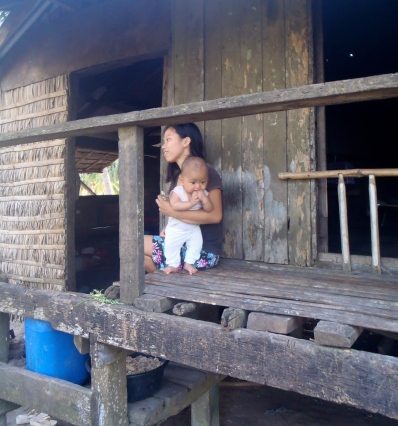 Roslyn with her son sitting at the porch of their house in the mountains of xx.. Thevictim of the crime – he lost his grandmother even before his birth.